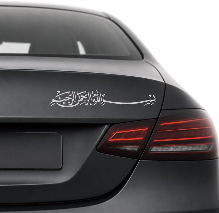 White Bismillah car sticker with Arabic calligraphy on the tailgate of a grey car